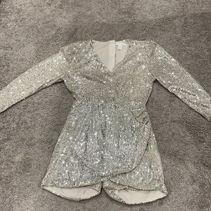 Sparkly gold dressy long sleeve romper